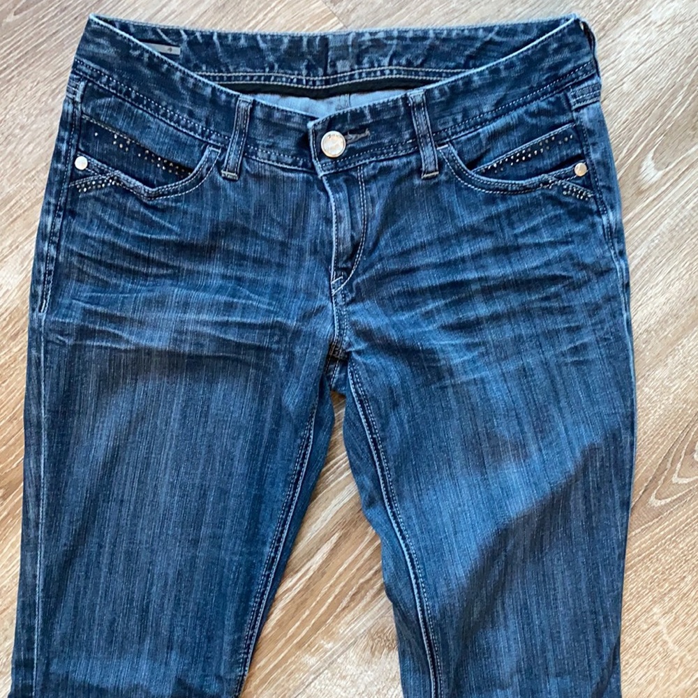 Express Mid Rise Darker Wash Skinny Jeans - Picture 2 of 11